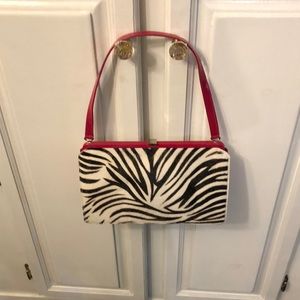 Zebra trimmed in pink and blue inside